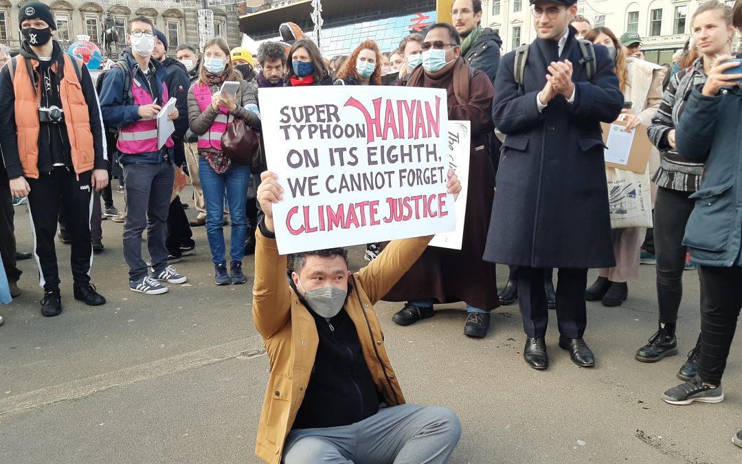 IN PHOTOS: Filipino climate activists in Manila and Glasgow march to demand justice and concrete ecological action